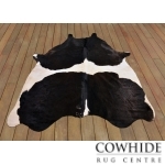 Elégant tapis en peau de vache noir et blanc