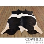 Elégant tapis en peau de vache noir et blanc