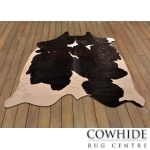 Magnifique tapis en peau de vache blanc et noir